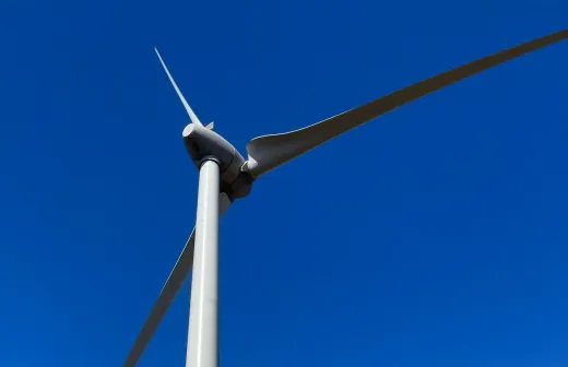 The Kilbirnie wind turbine with a blue sky behind it
