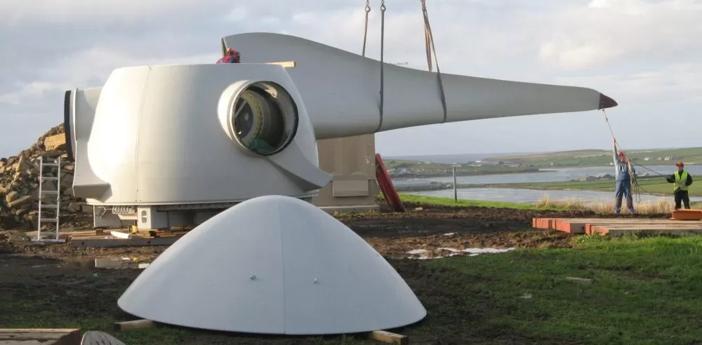 Workers constructing a turbine