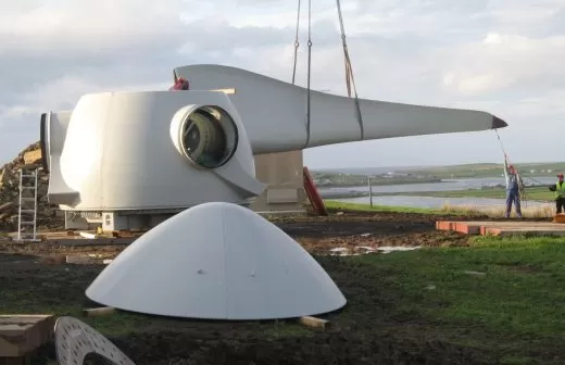 Workers constructing a turbine