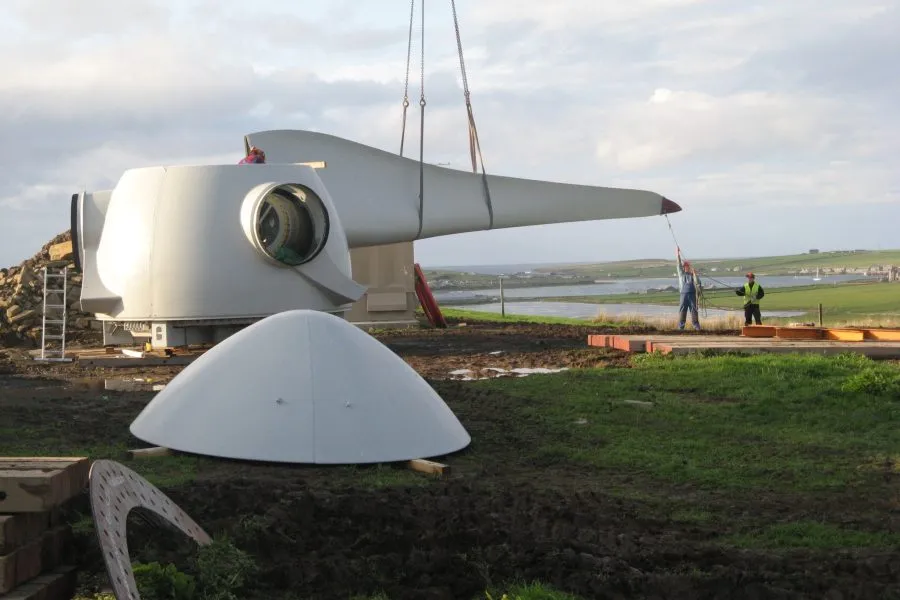 Workers building a turbine